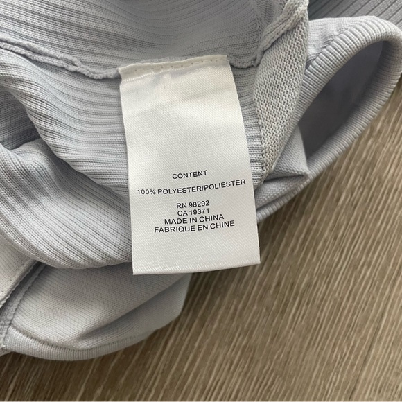 Tibi Ribbed Knit Button Snap Front Point Collared Polo Bodysuit in Light Blue - Picture 10 of 12